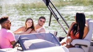 Young people enjoying their day on a pontoon boat