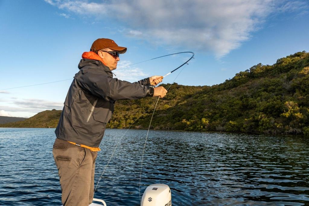 Double hulling a fly rod mid cast on a skiff in Sedgefield