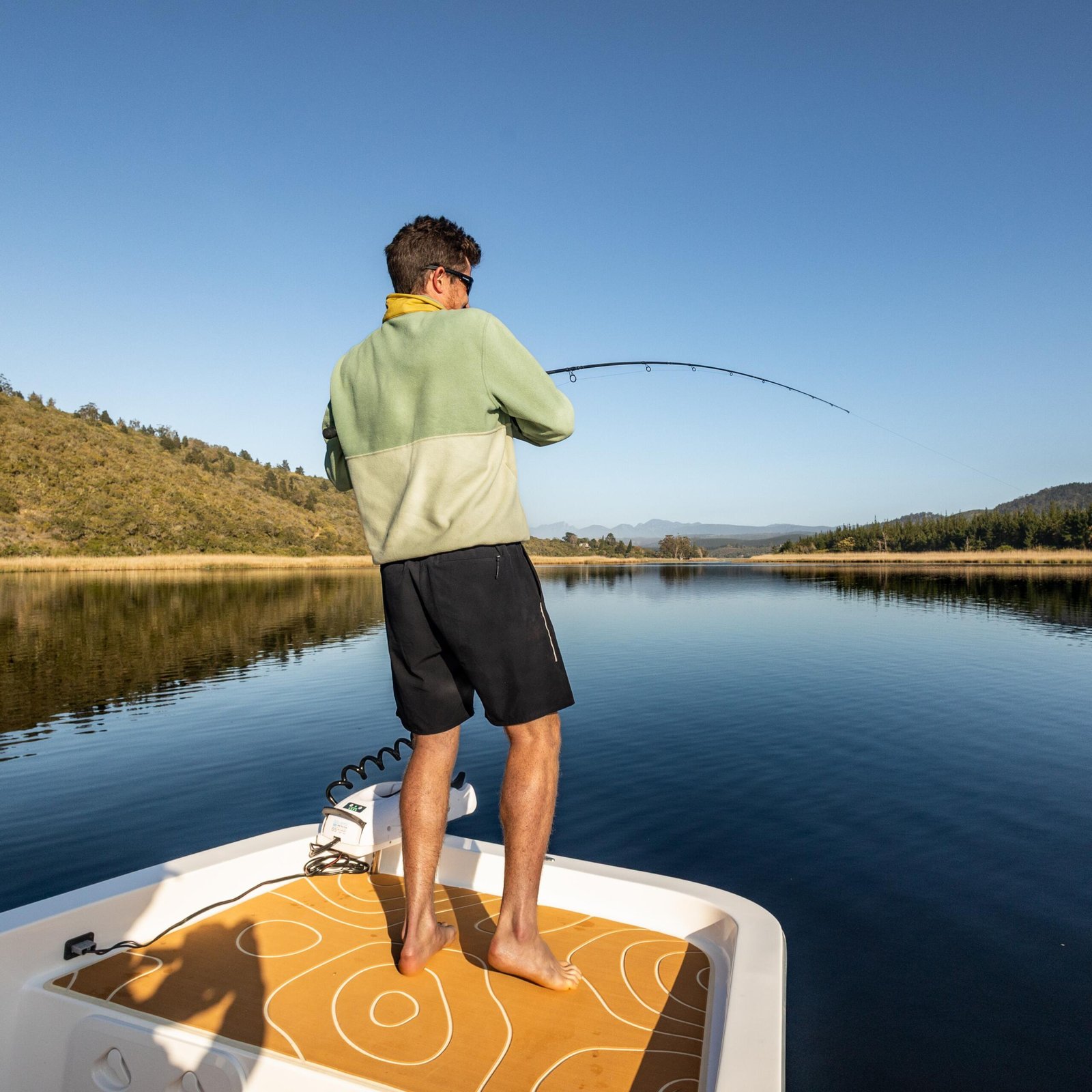 Fishing charter on the Swartvlei estuary in Sedgefield, Garden Route